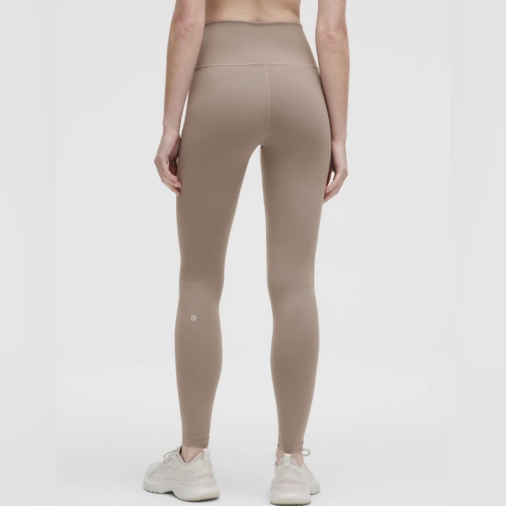 Lululemon Wunder Train High-Rise Tight 28"
Warm Ash Grey Size: 10